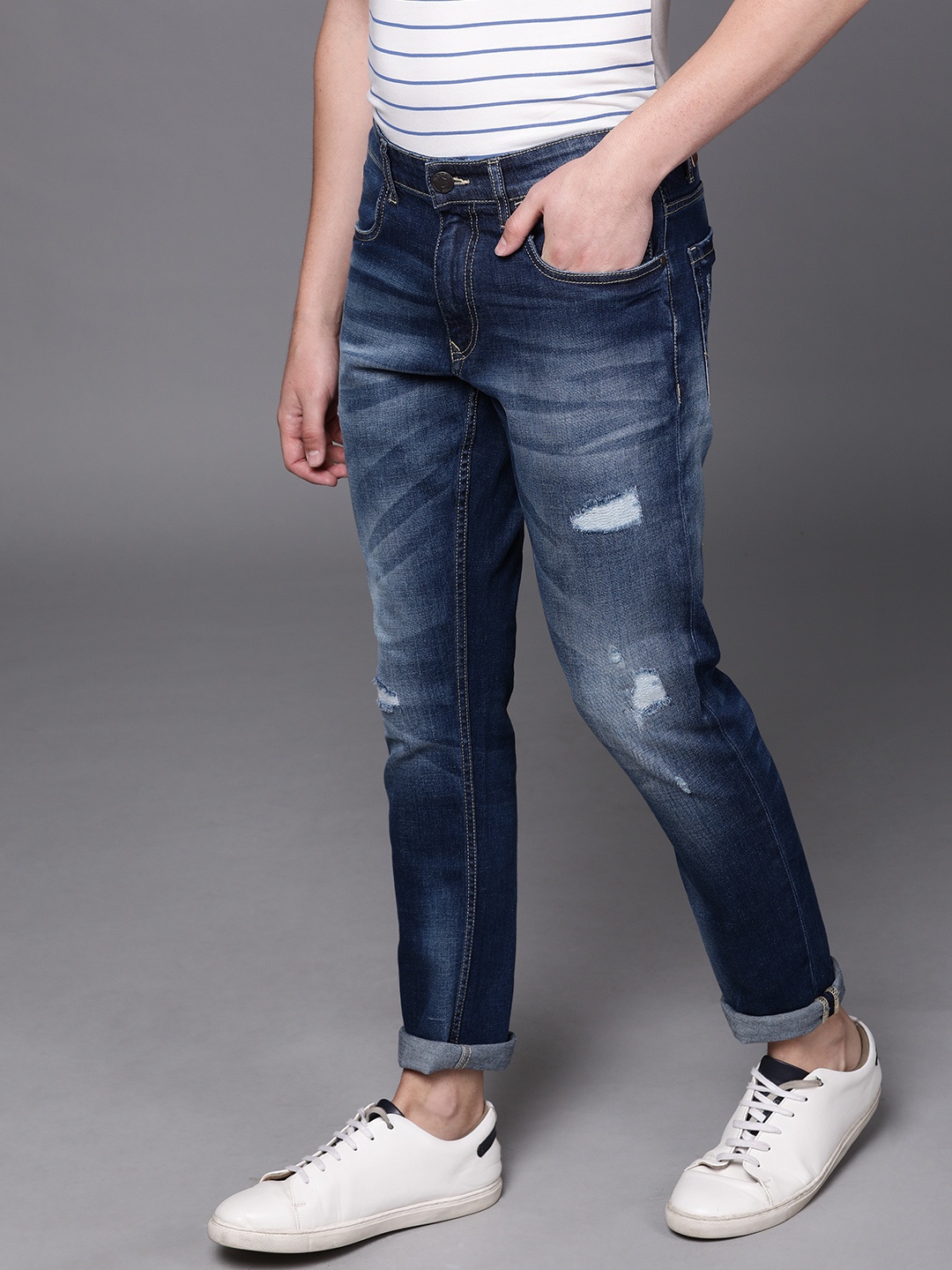 

WROGN Men Blue Slim Fit Mid-Rise Highly Distressed Stretchable Jeans