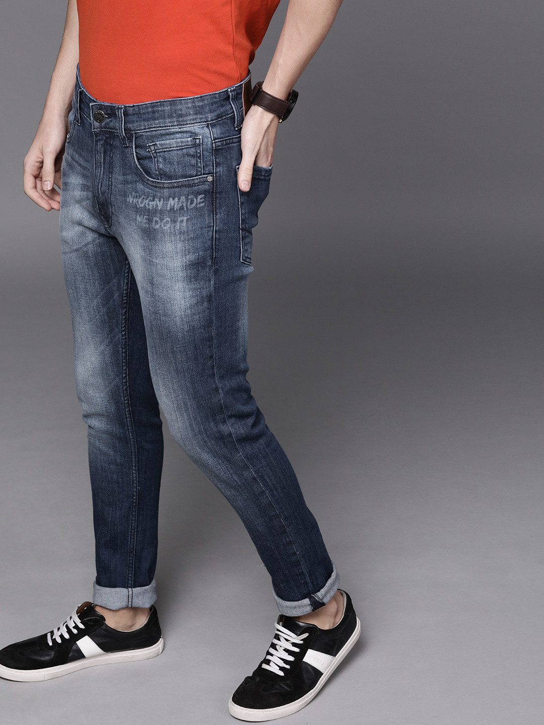 

WROGN Men Blue Skinny Fit Mid-Rise Clean Look Stretchable Jeans With Printed Detailing