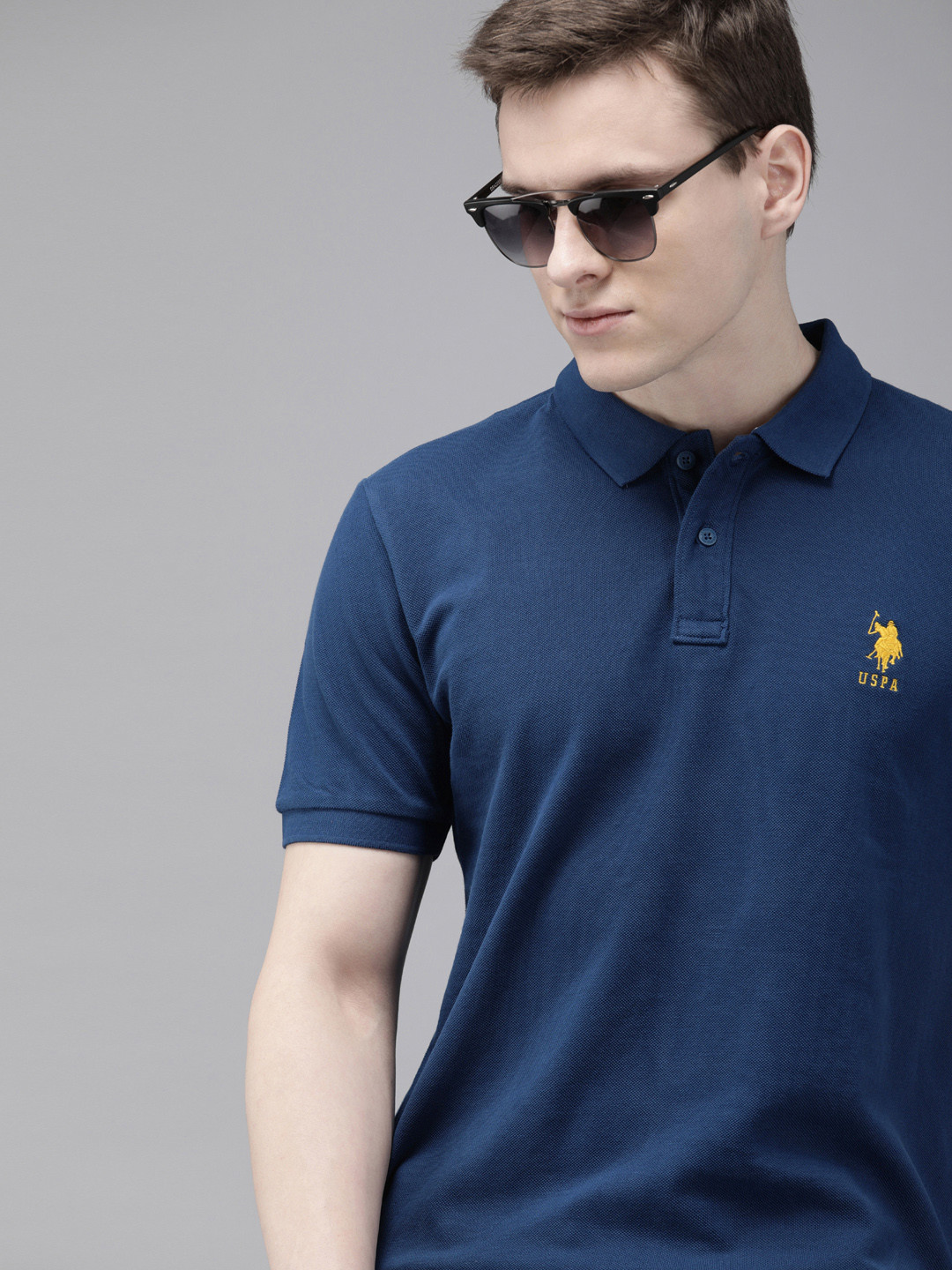 

U.S. Polo Assn. Men Blue Solid Polo Collar Pure Cotton T-shirt