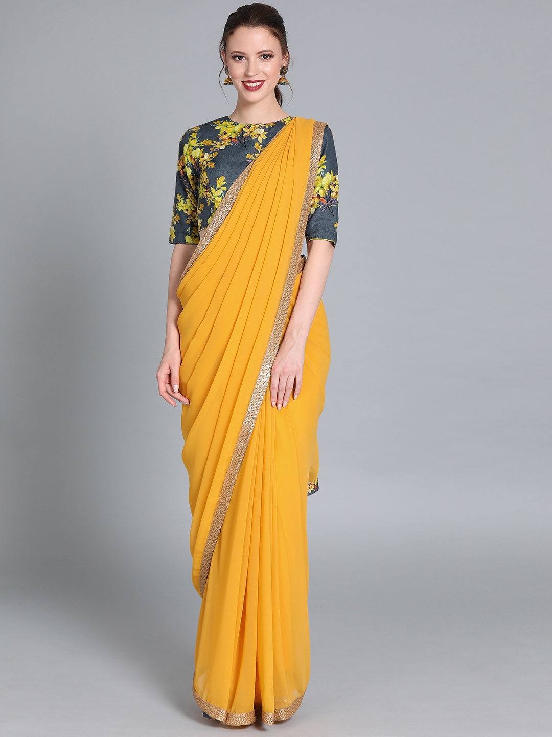 

Ethnovog Mustard Yellow Solid Poly Georgette Saree
