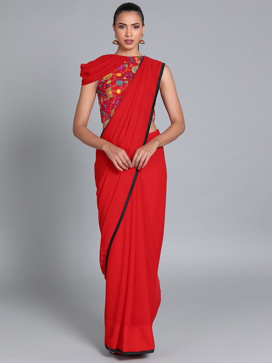 

Ethnovog Red Multicoloured Poly Georgette Solid Saree