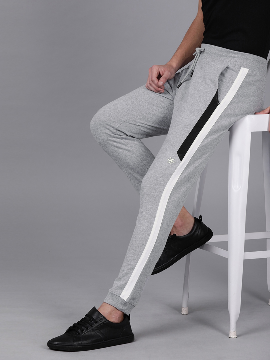 

WROGN Men Grey Melange Slim Fit Solid Joggers With Side Stripes