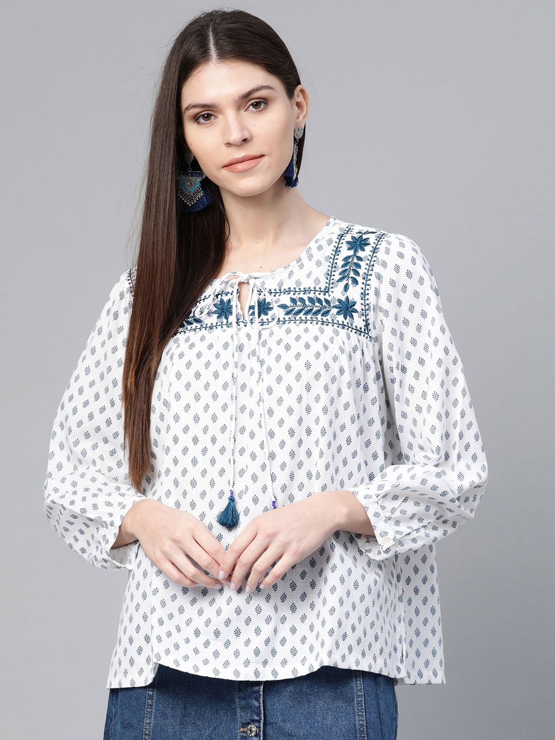 

Rangriti Women White & Teal Blue Embroidered Ethnic Printed Top