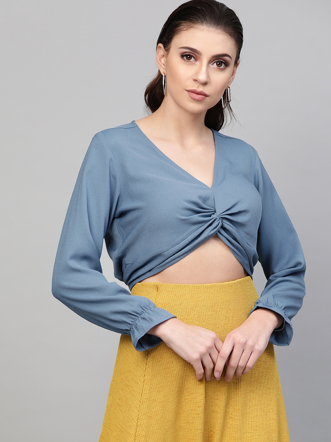 

SASSAFRAS Women Blue Solid Twisted Blouson Cropped Top