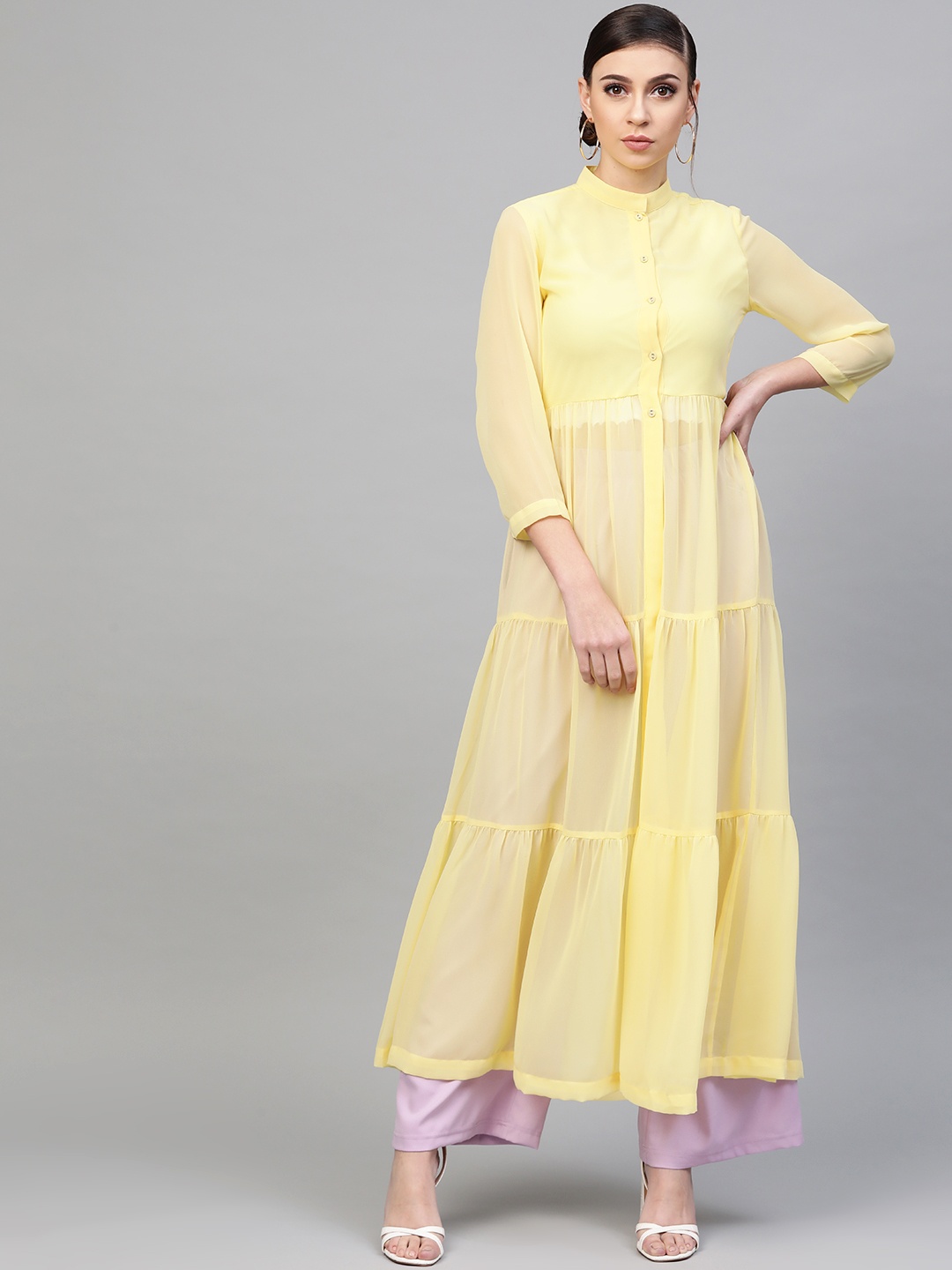 

SASSAFRAS Women Yellow Solid Tiered Maxi Top