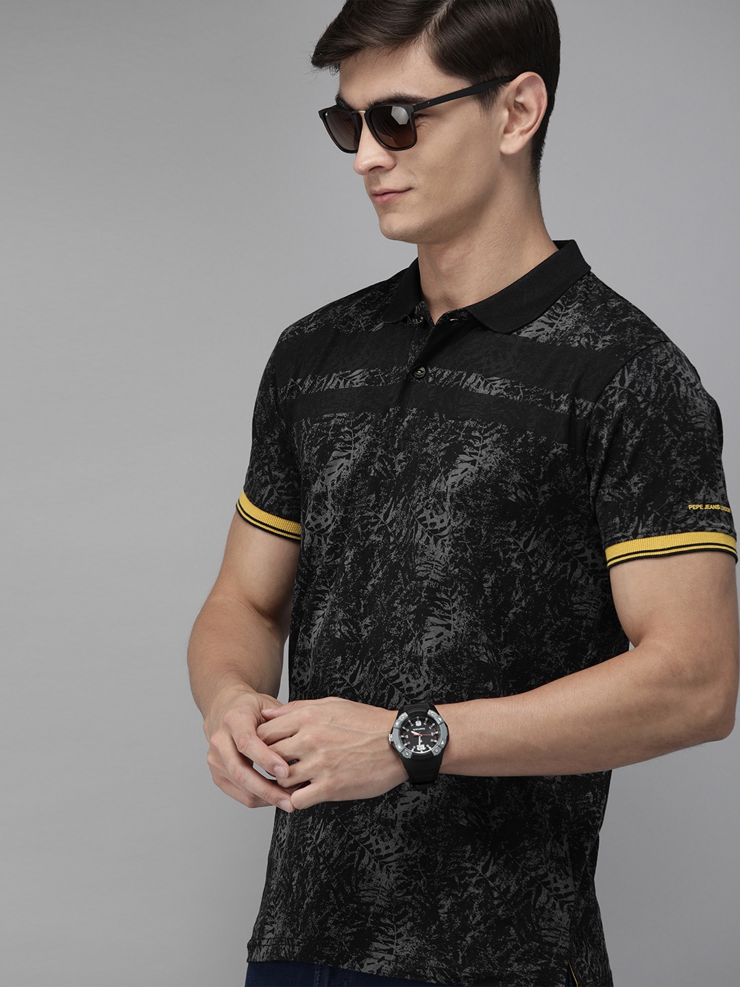 

Pepe Jeans Men Charcoal Grey Abstract Print Polo Collar T-shirt