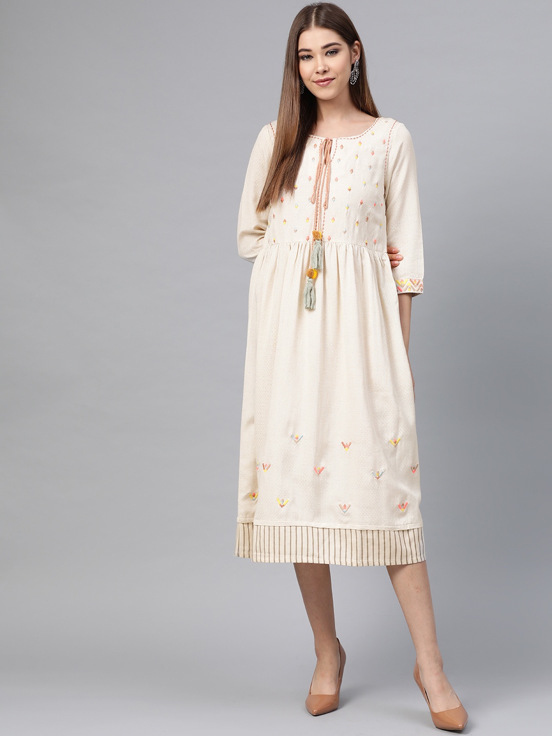 

W Cream-Coloured Embroidered Ethnic Motifs Tie-Up Neck Ethnic A-Line Midi Dress