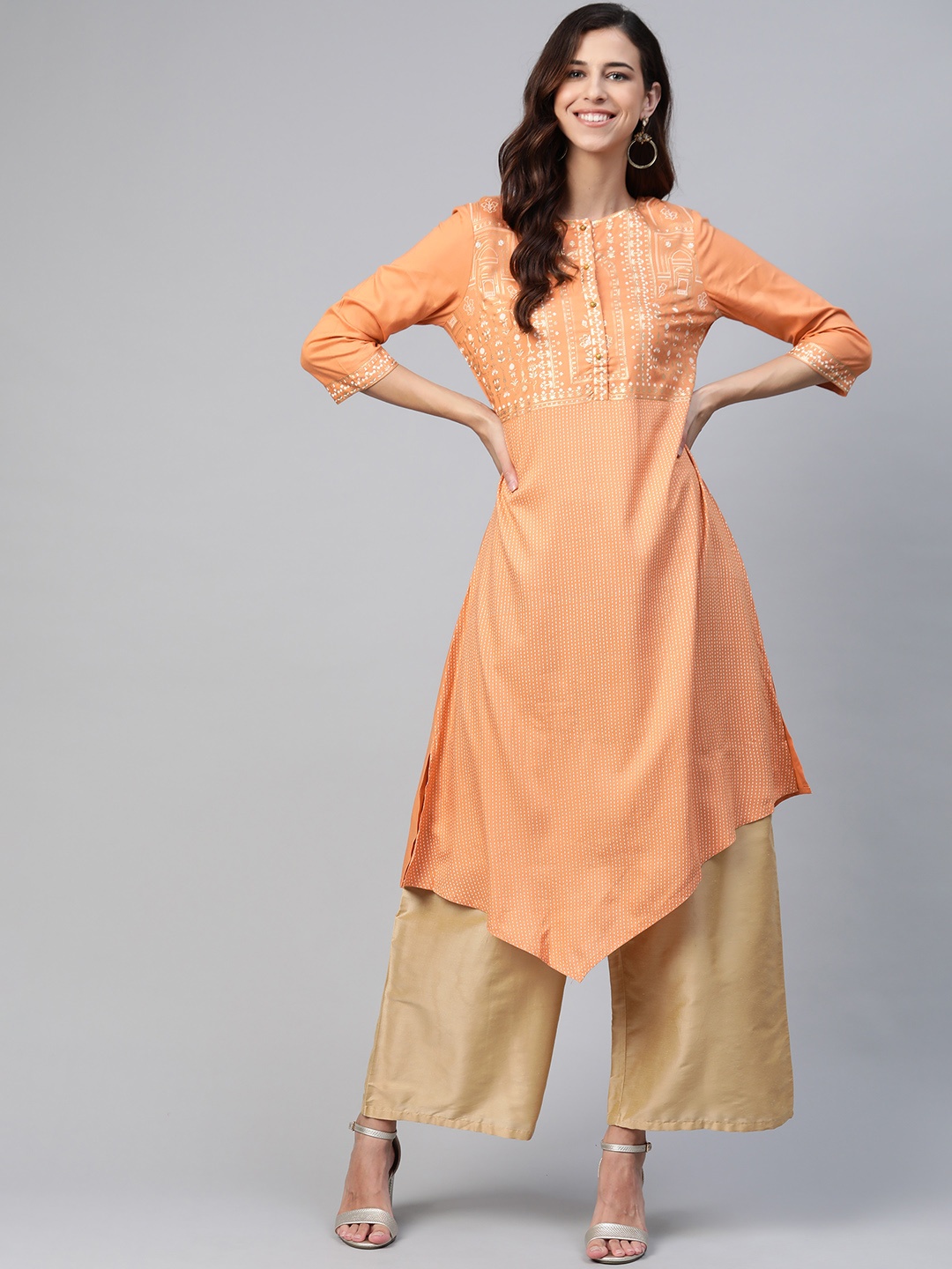 

W Women Orange & Off White Striped Asymmetric Hem Kurta