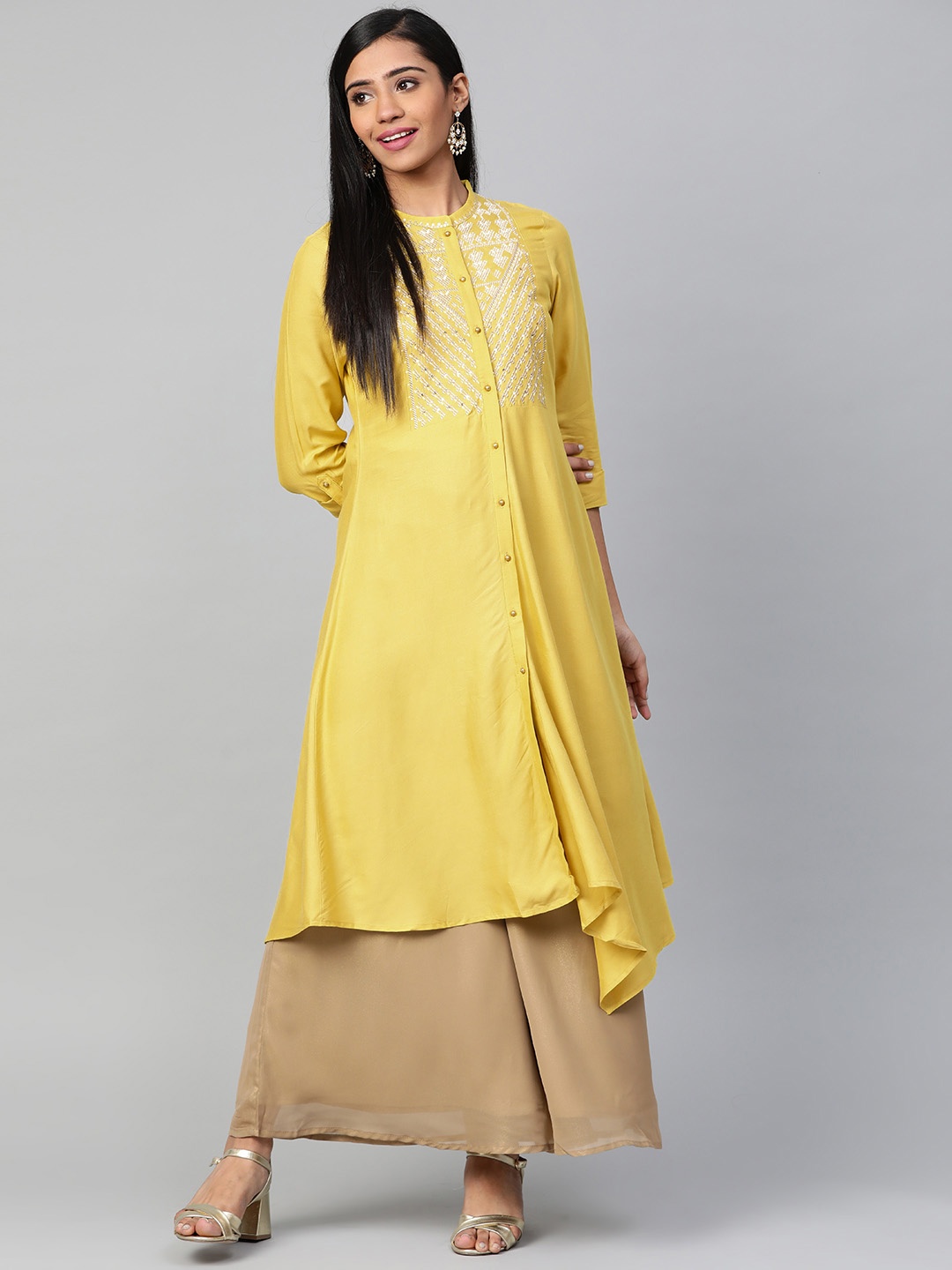 

W Women Mustard Yellow Embroidered Yoke Design Asymmetric Hem A-Line Kurta
