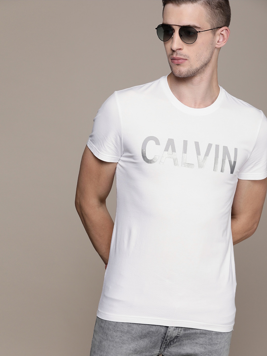 

Calvin Klein Jeans Men White Slim Fit Printed Round Neck T-shirt