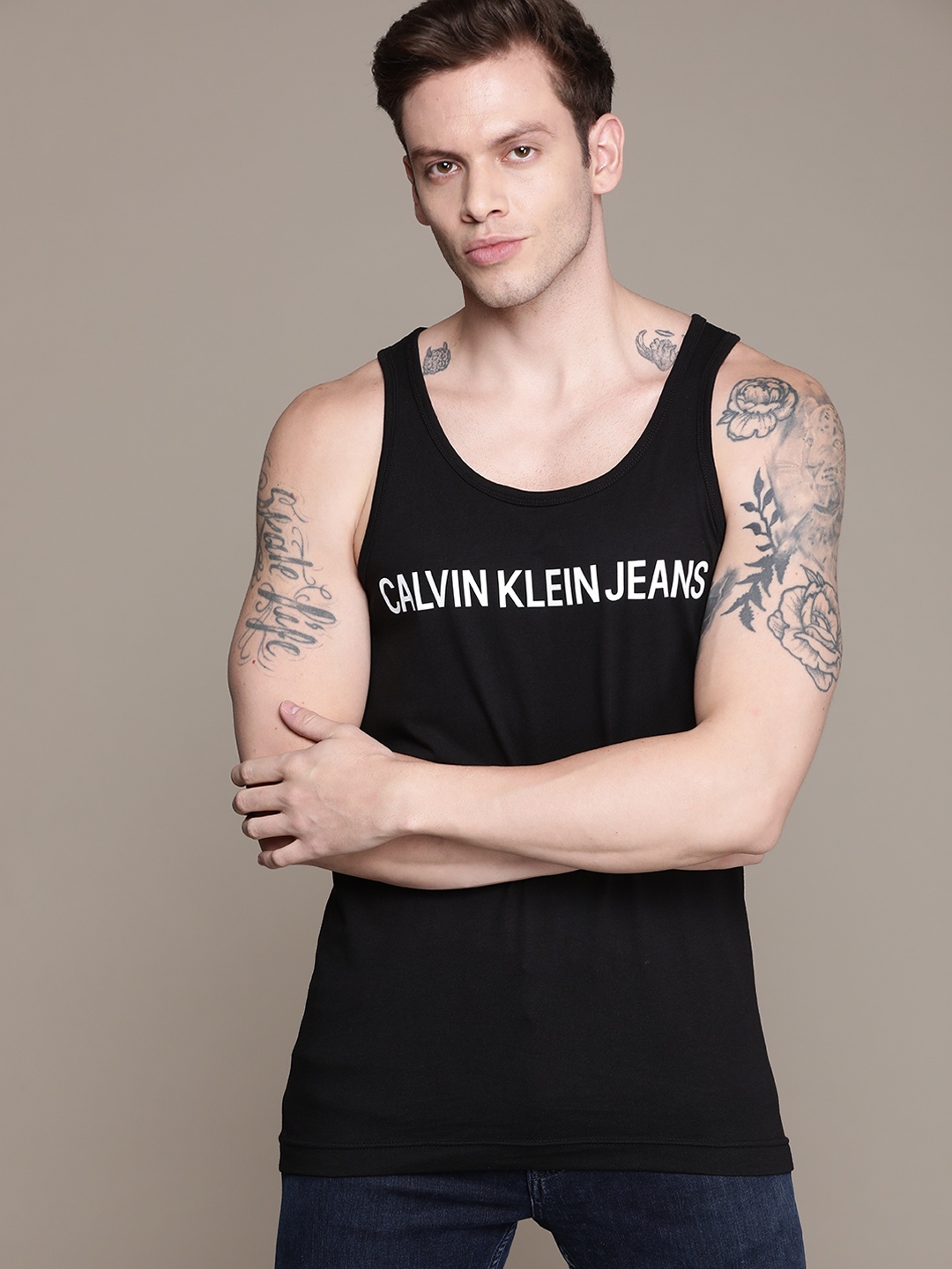 

Calvin Klein Jeans Men Black & White Brand Logo Printed Sleeveless Pure Cotton T-shirt