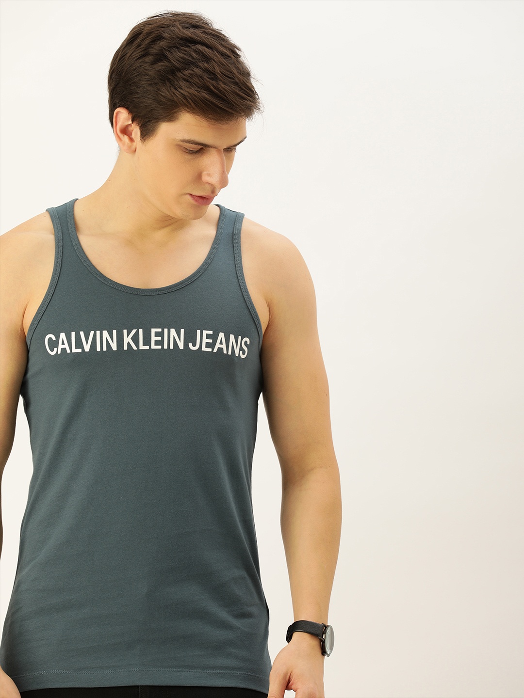 

Calvin Klein Jeans Men Teal Blue Printed Round Neck Pure Cotton T-shirt