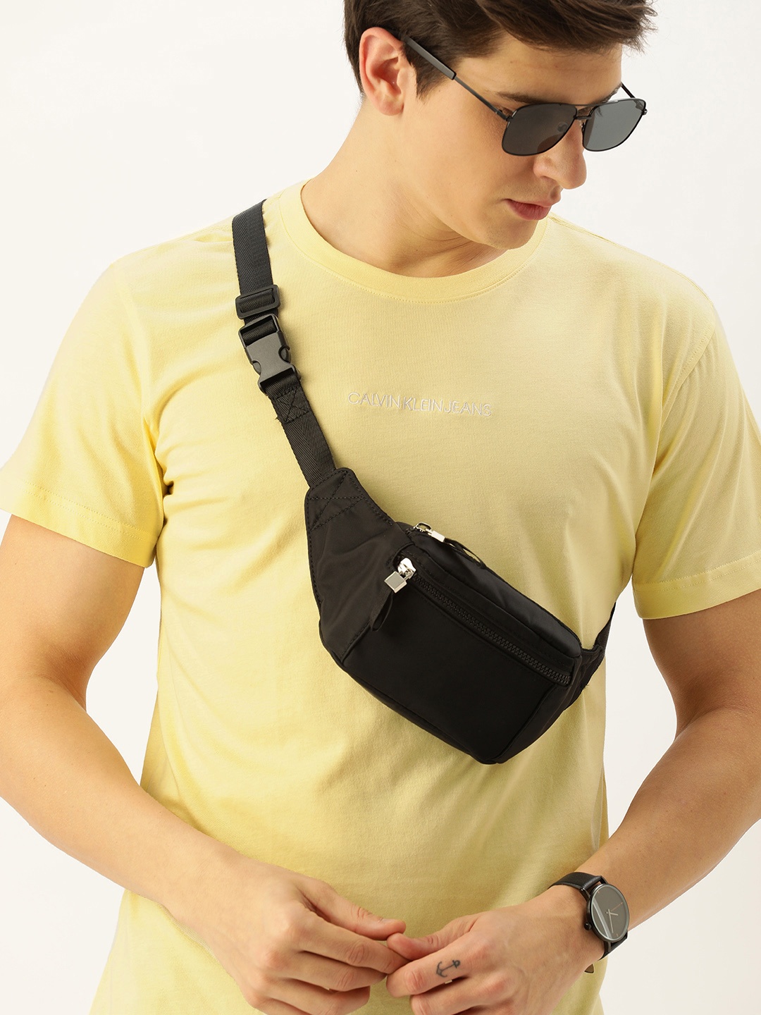 

Calvin Klein Jeans Men Yellow Solid Round Neck Pure Cotton T-shirt with Embroidered Detail