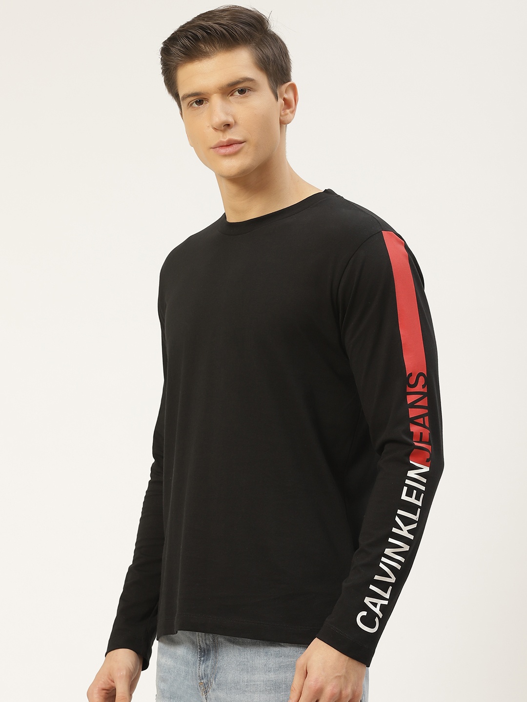 

Calvin Klein Jeans Men Black Solid Round Neck T-shirt