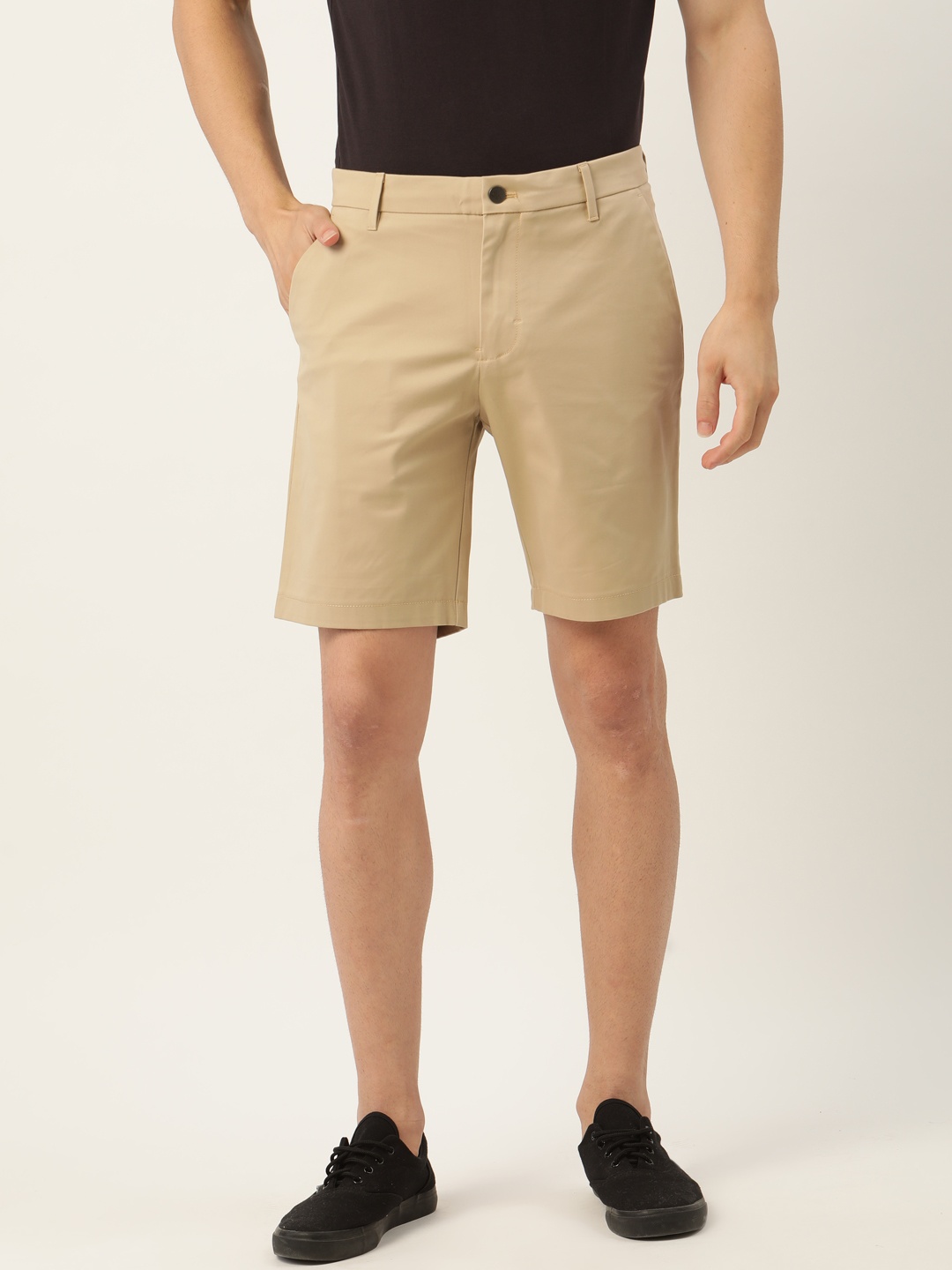 

Calvin Klein Jeans Men Beige Solid Slim Fit Regular Shorts