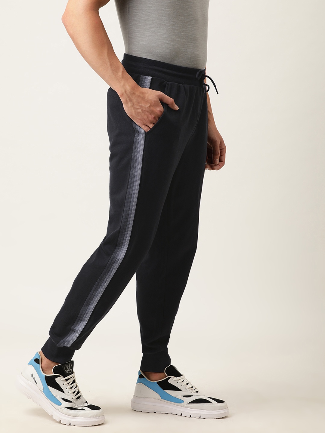 

Calvin Klein Jeans Men Black Slim Fit Logo Printed Joggers with Side Stripes