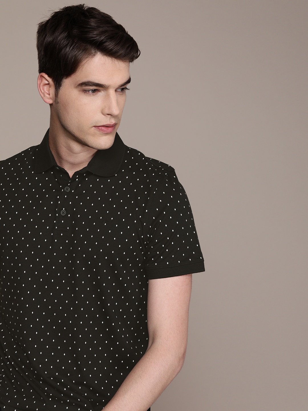

Calvin Klein Jeans Men Black & White Printed Polo Collar T-shirt