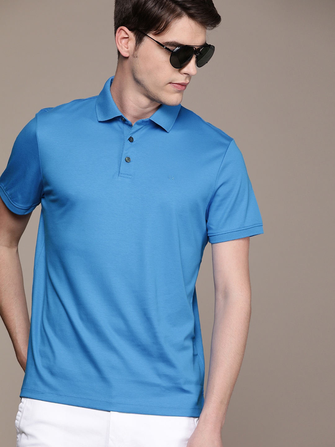 

Calvin Klein Jeans Men Blue Solid Polo Collar Liquid Touch T-shirt
