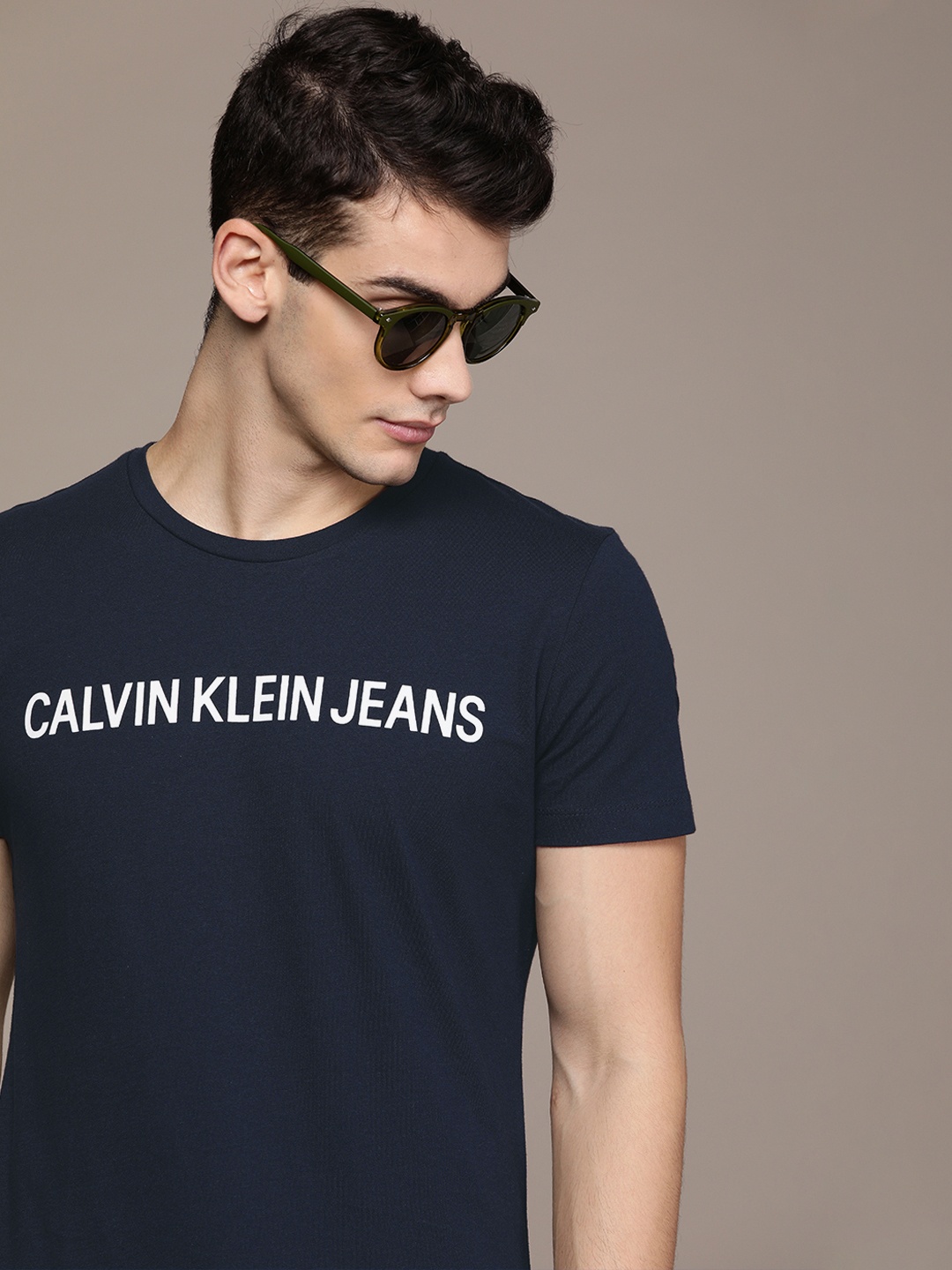 

Calvin Klein Jeans Men Navy Blue Printed Round Neck Pure Cotton T-shirt