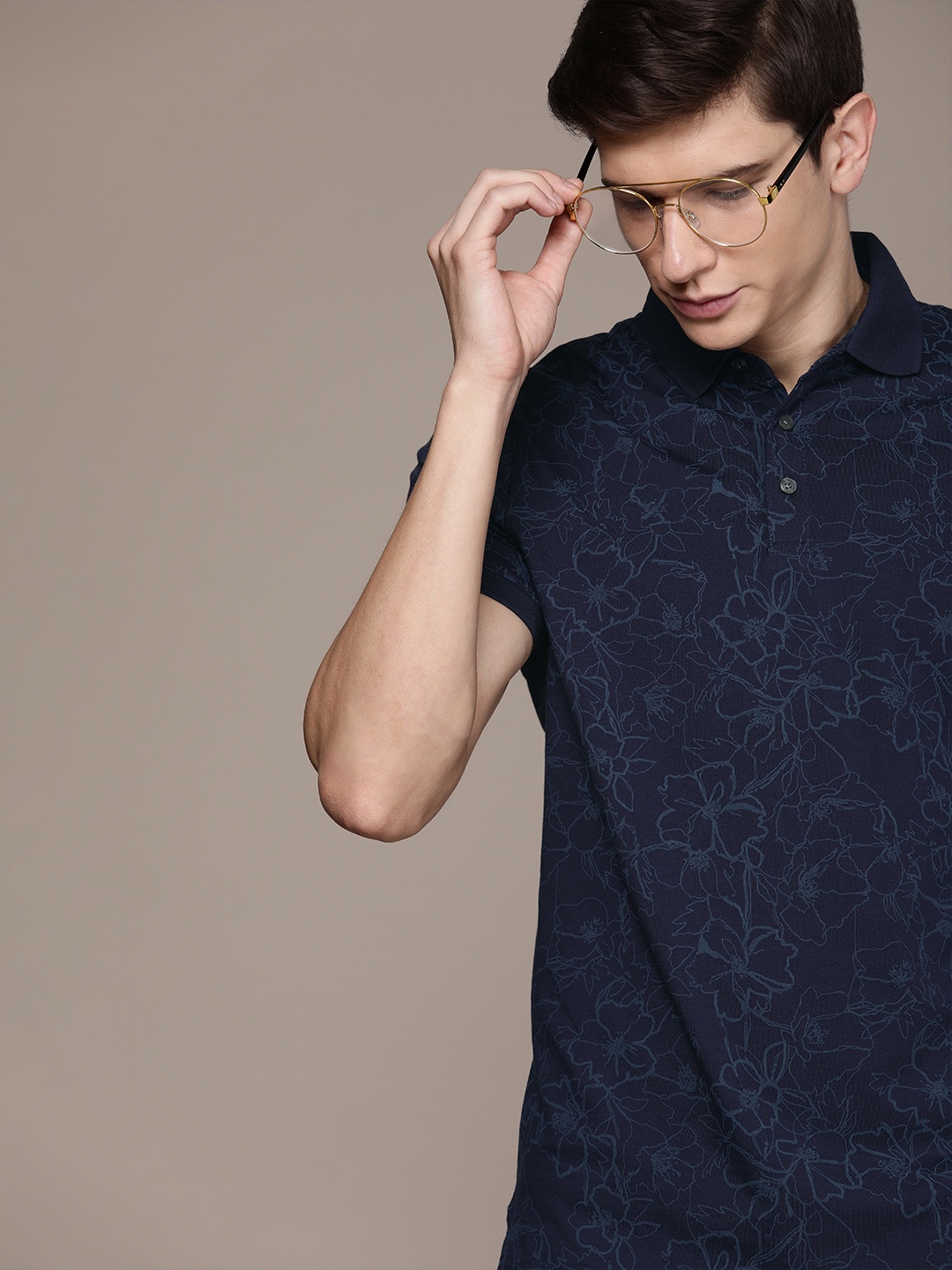 

Calvin Klein Jeans Men Blue Printed Polo Collar Pure Cotton T-shirt