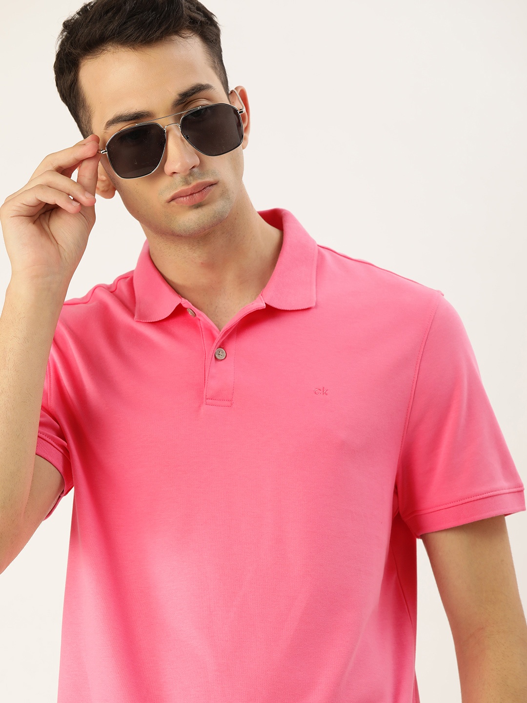 

Calvin Klein Jeans Men Pink Solid Polo Collar Pure Cotton T-shirt