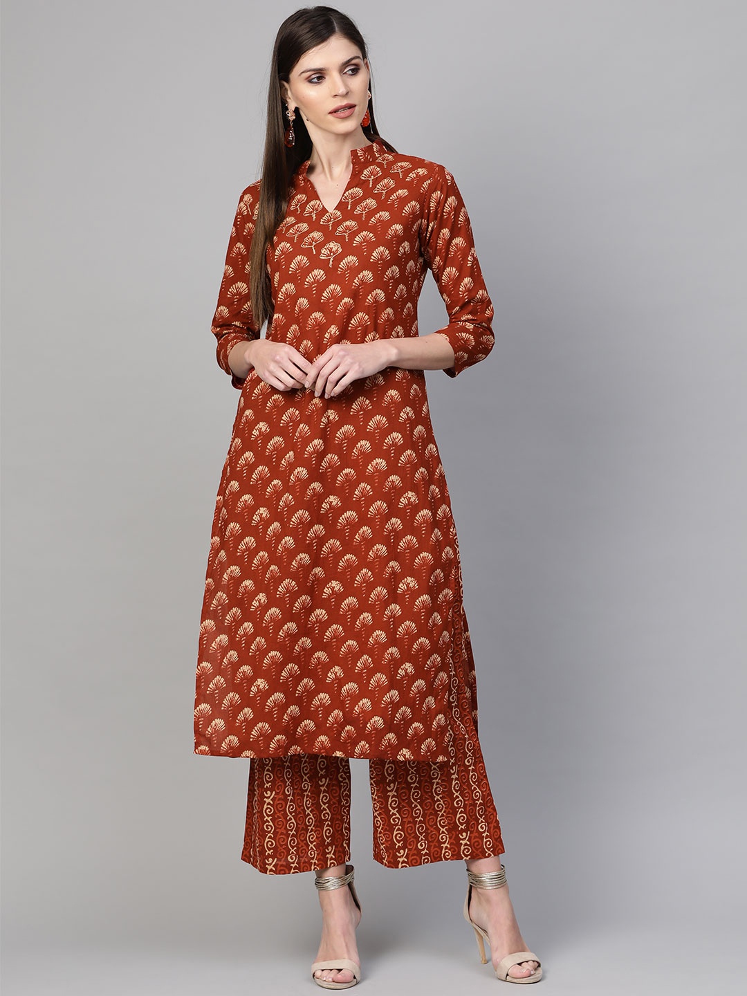 

Indo Era Women Rust Orange & Beige Printed Kurta with Palazzos