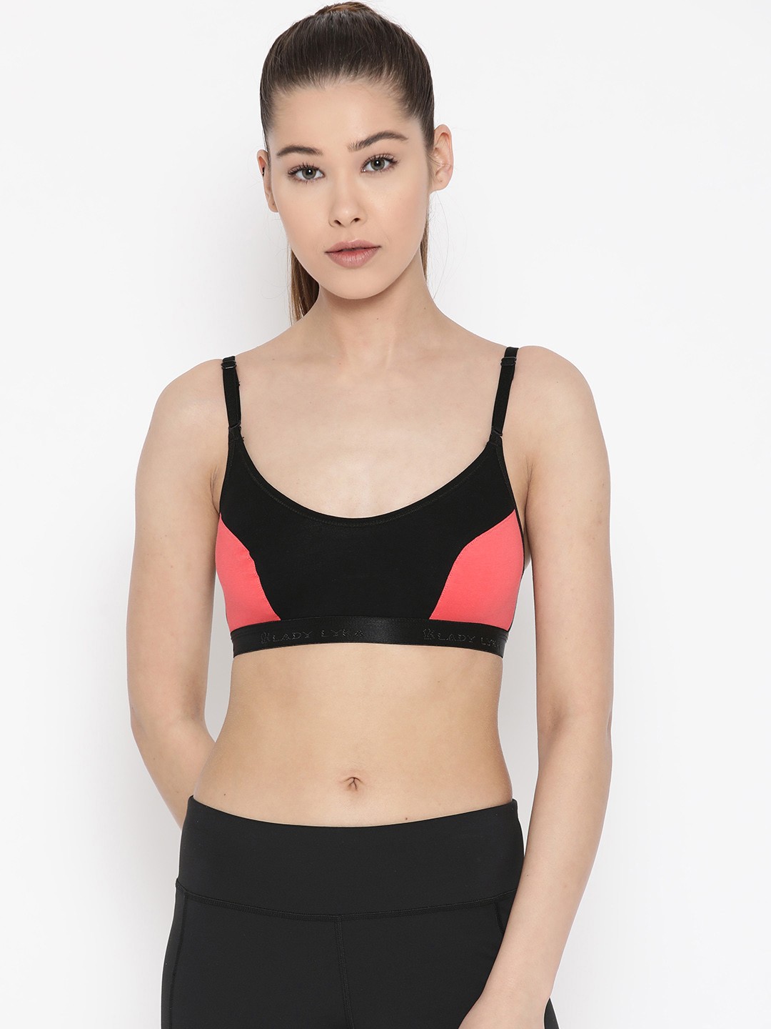 

Lady Lyka Black & Peach-Coloured Colourblocked Non-Wired Non Padded Sports Bra