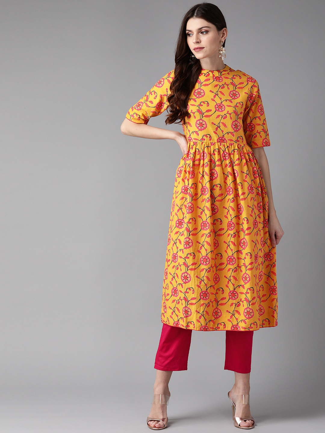 

Indo Era Women Mustard Yellow & Pink Screen Printed Kurta with Trousers