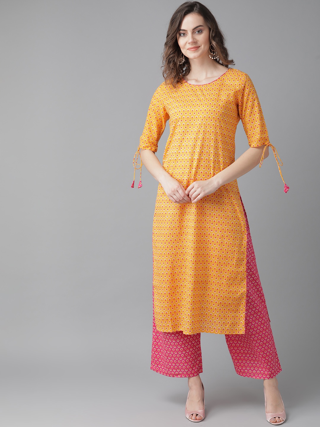 

Indo Era Women Yellow & Pink Screen Print Kurta with Palazzos
