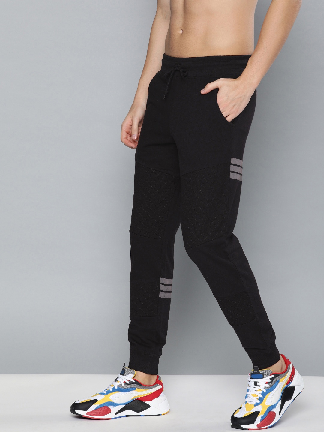

HERE&NOW Men Black Solid Slim Fit Joggers With Printed Detail
