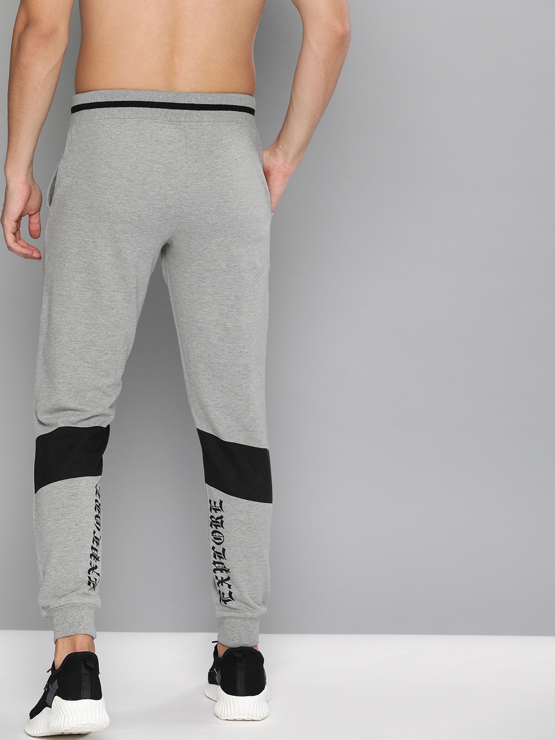 

HERE&NOW Men Grey Melange Solid Straight Fit Joggers With Printed Detailing