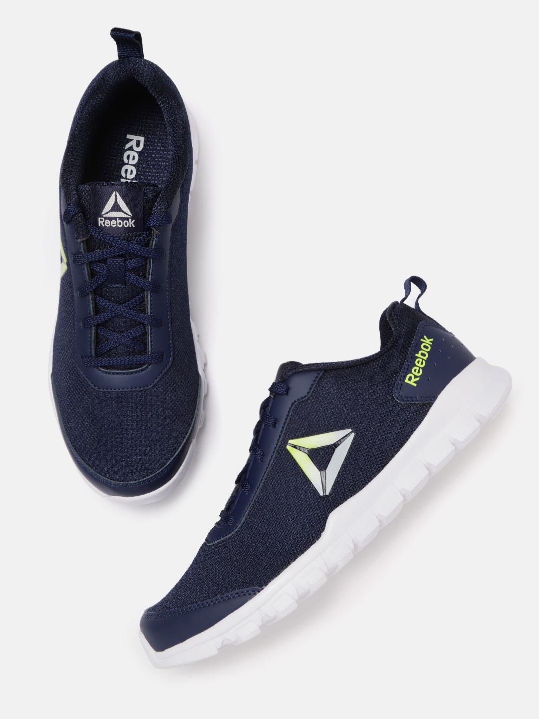 

Reebok Men Navy Blue Solid Revolution Training Shoes