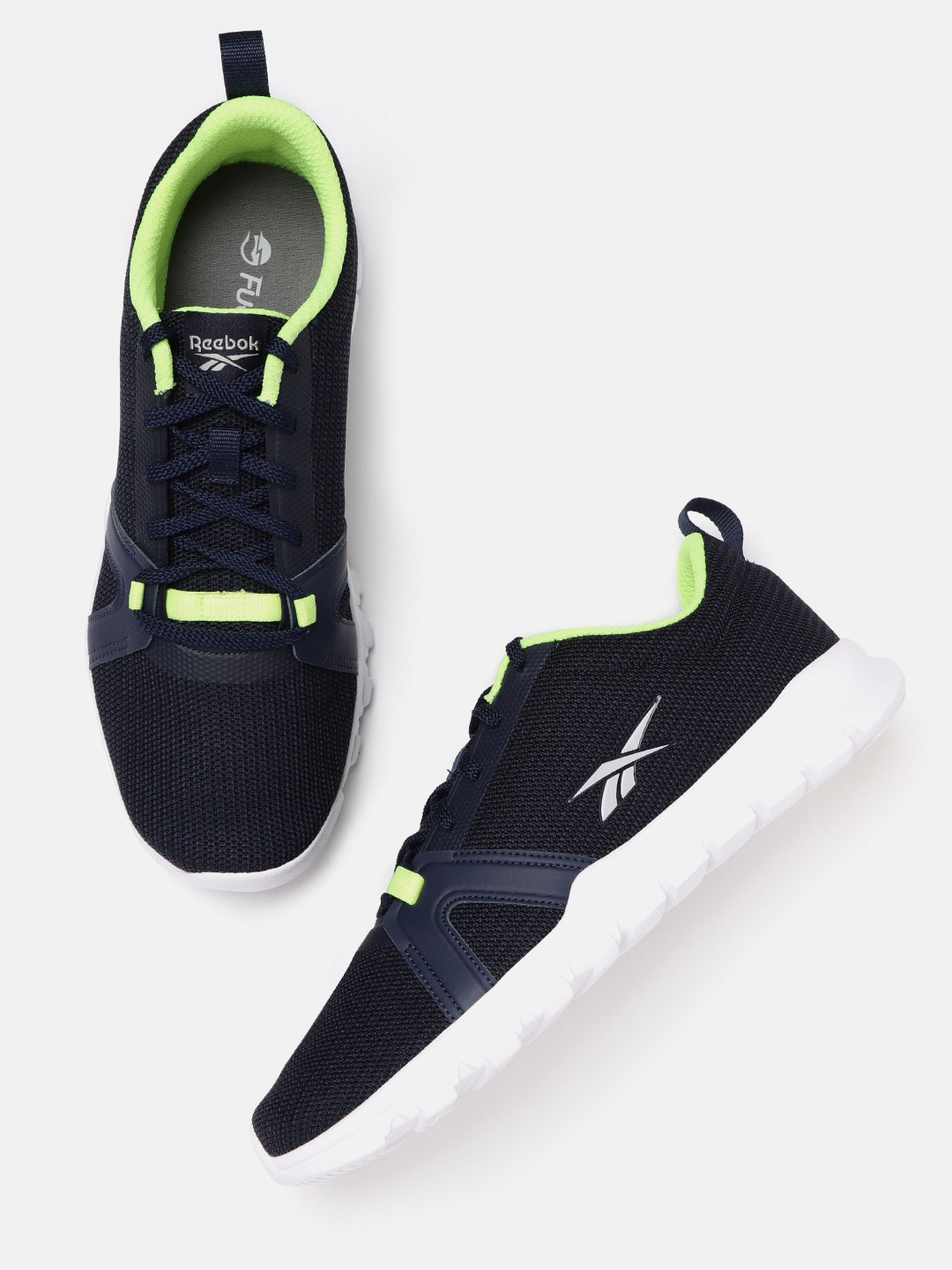

Reebok Men Navy Blue Self Striped Lite Training Shoes