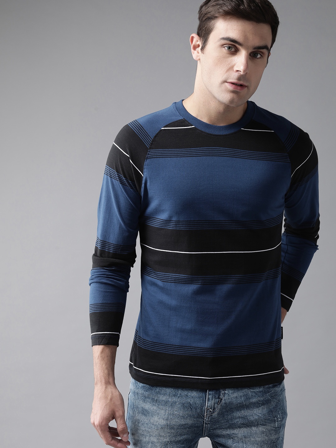 

Roadster Men Navy Blue & Black Striped Round Neck T-shirt