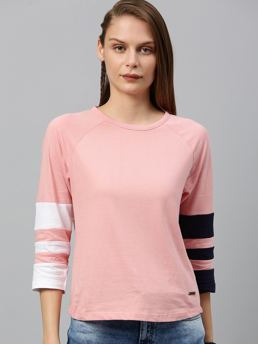 

Roadster Women Pink Solid Top with Striped Sleeves