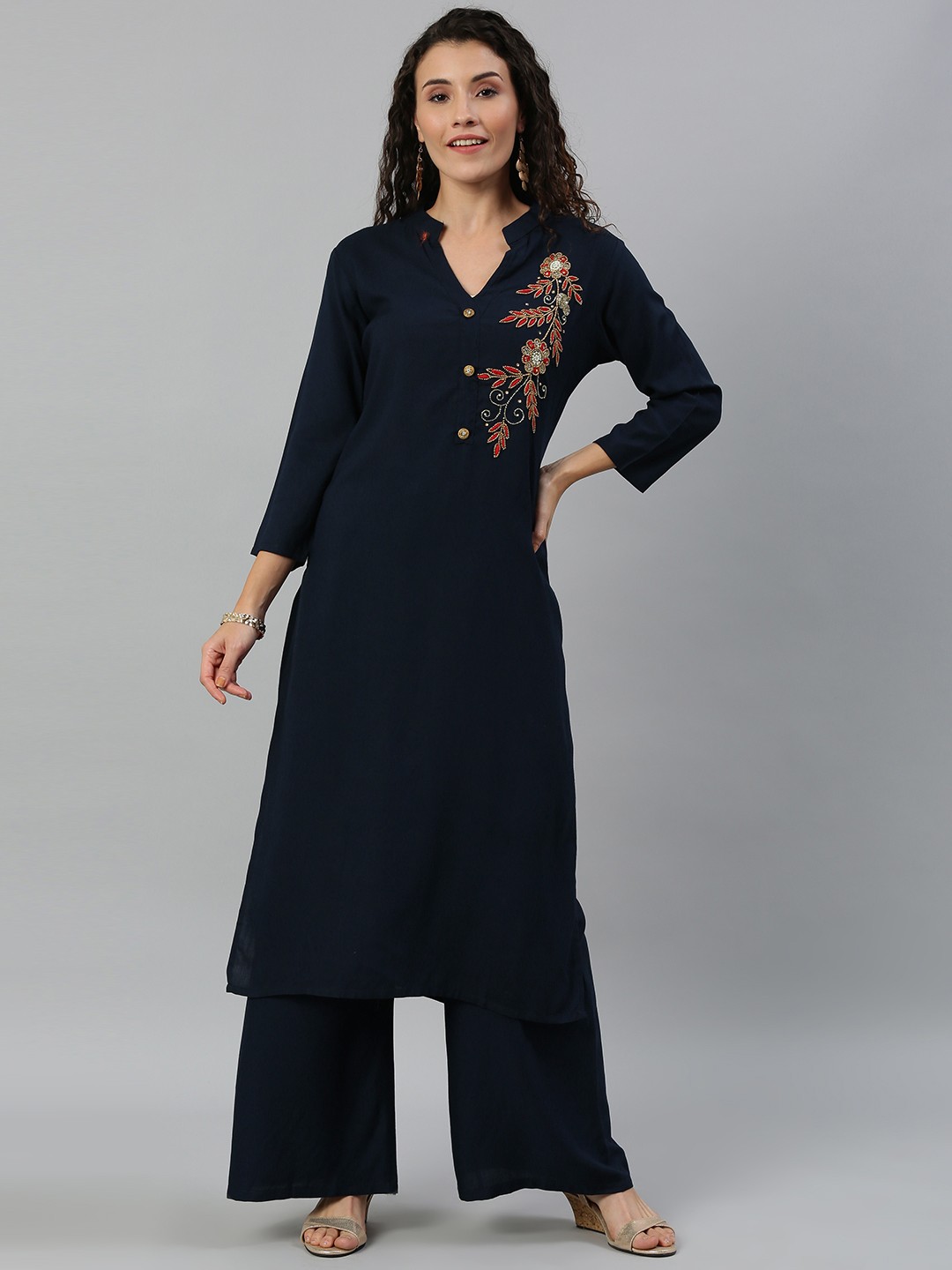 

Blissta Women Navy Blue Solid Kurta with Palazzos With Embellished Detailing