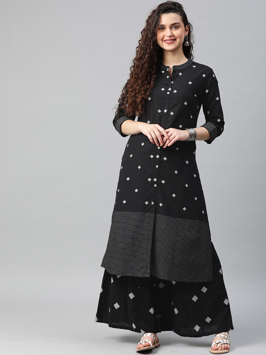 

Alena Women Black Woven Design A-Line Kurta