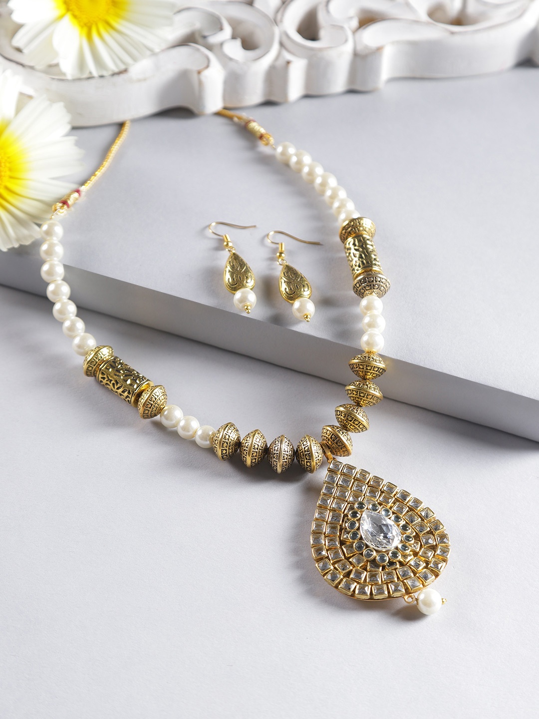 

Jewels Galaxy Off-White Antique Gold-Plated Stone-Studded Beaded Jewellery Set