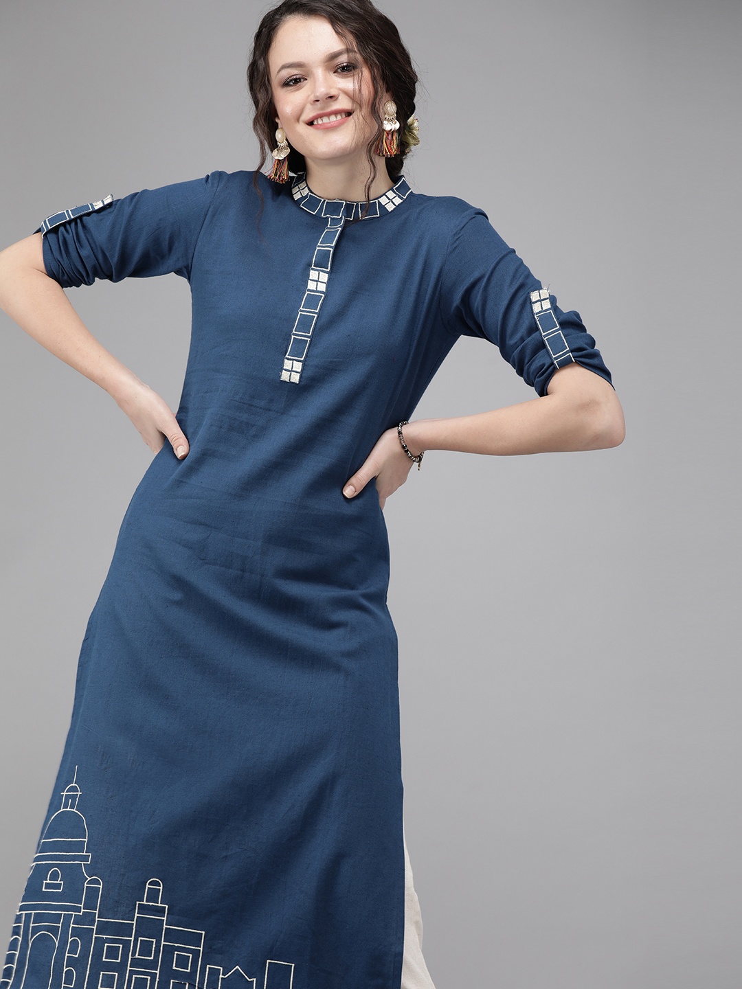 

Women Blue Solid straight Kurta With Embroidered Detail