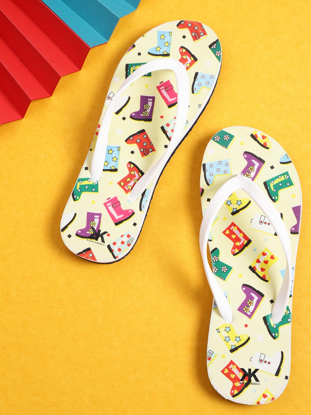 

Kook N Keech Women White & Yellow Printed Thong Flip-Flops