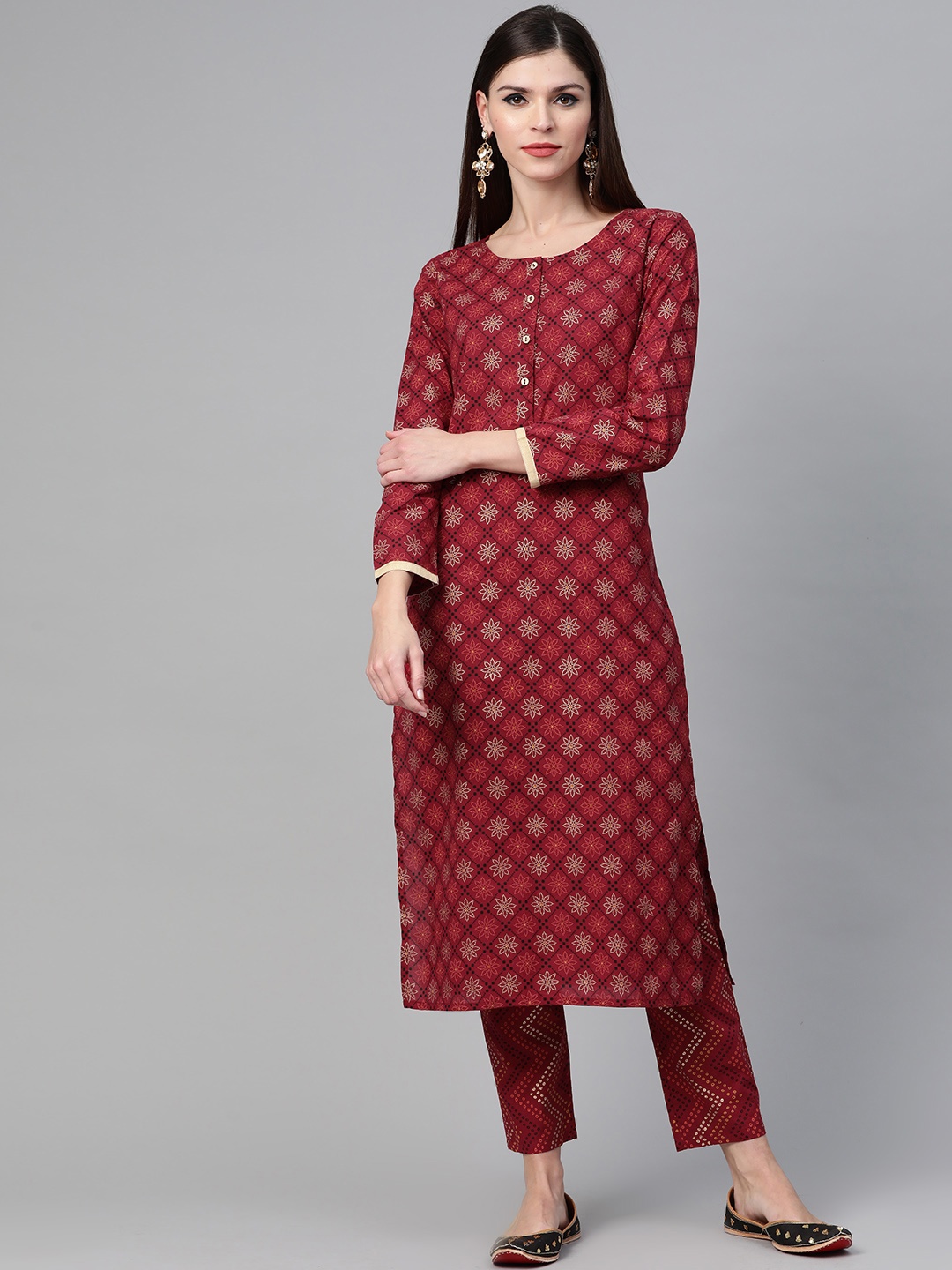 

See Designs Women Maroon & Golden Screen Print Kurta with Trousers