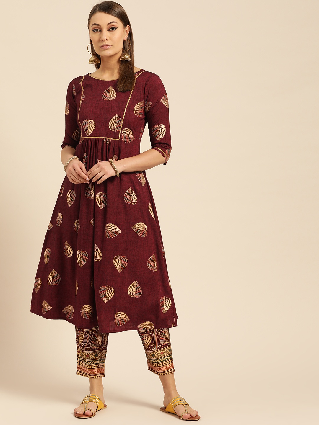 

Libas Women Maroon & Golden Printed Kurta with Trousers