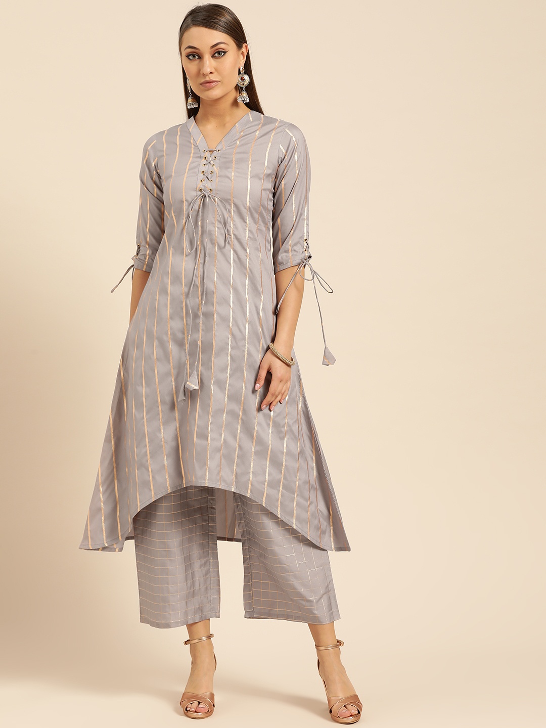 

Libas Women Grey & Golden Striped Kurta with Palazzos