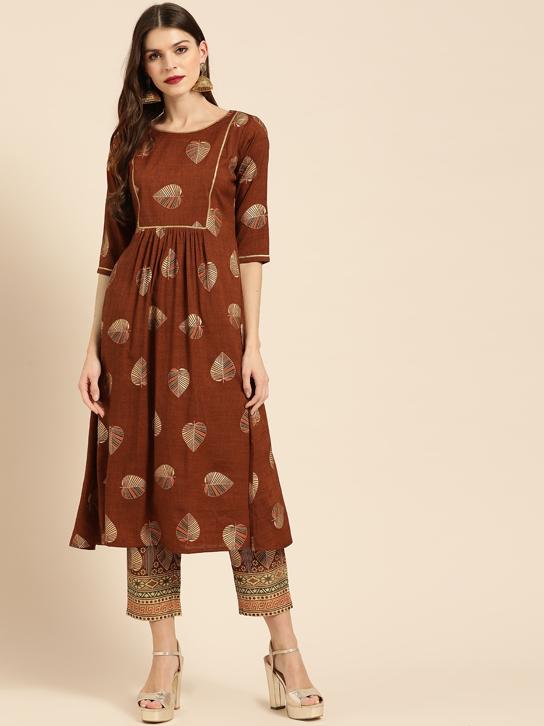 

Libas Women Brown & Golden Printed Kurta with Trousers
