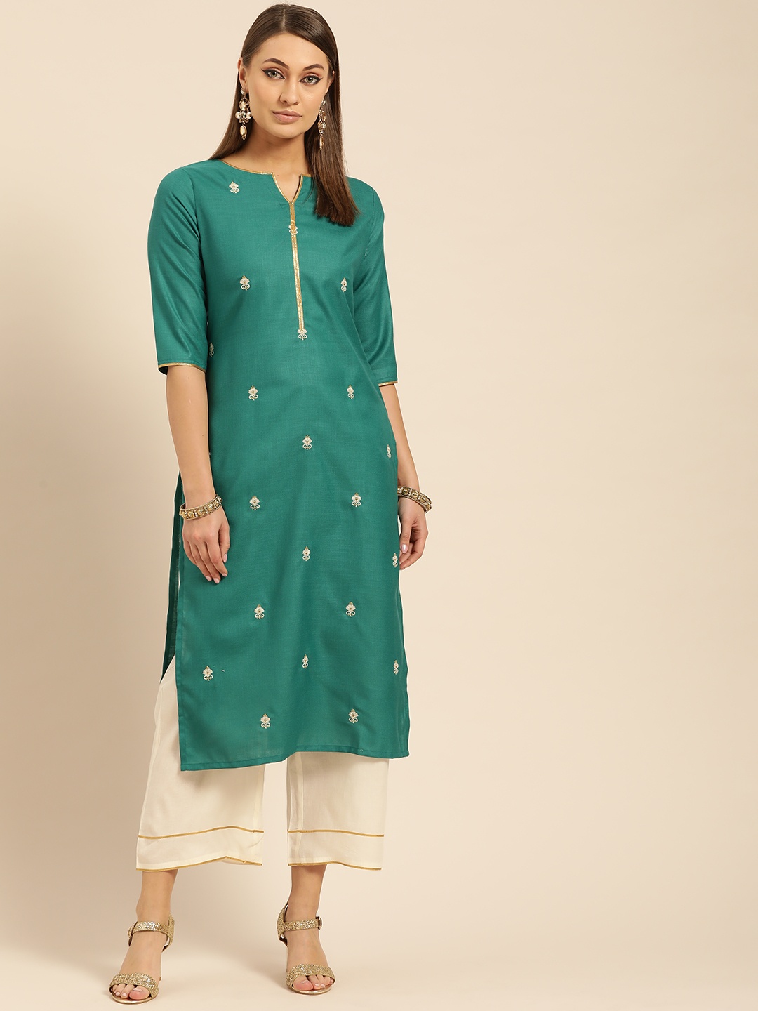 

Libas Women Green & Off-White Embroidered Kurta with Palazzos
