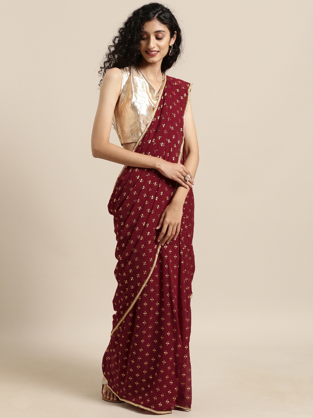 

Ahalyaa Maroon & Golden Georgette Printed Ready to Wear Saree