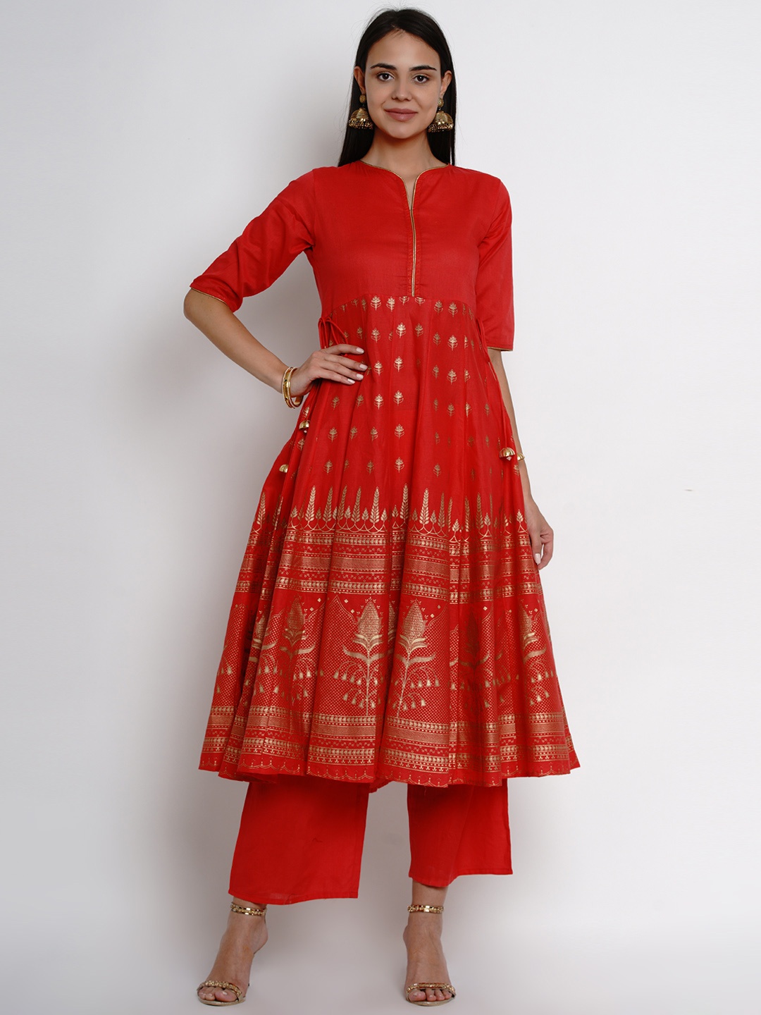 

Bhama Couture Women Orange & Gold-Coloured Printed Kurta with Palazzos
