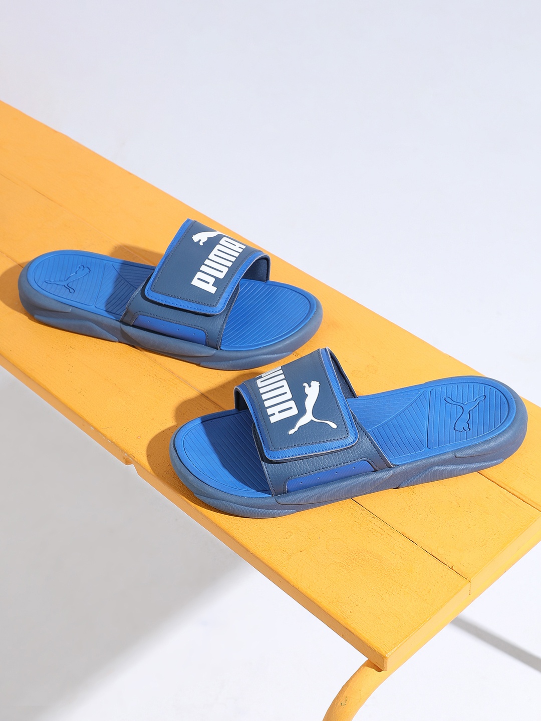 

Puma Unisex Blue Printed Royalcat Comfort Sliders