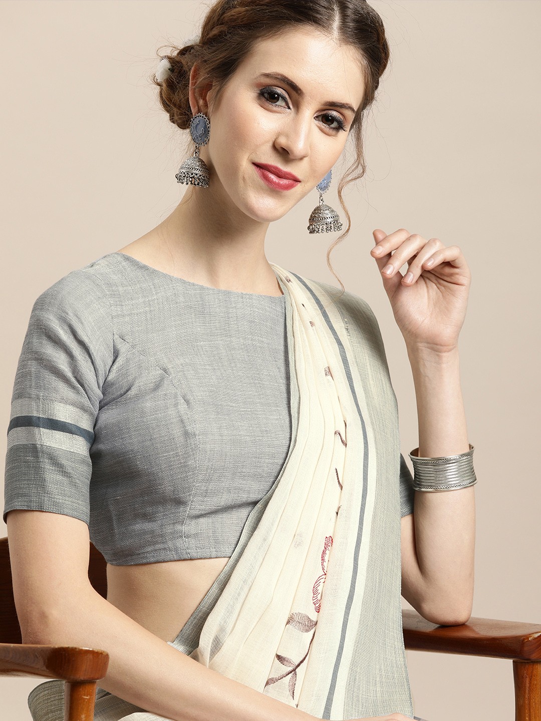 

Inddus Cream-Coloured Embroidered Linen Blend Saree