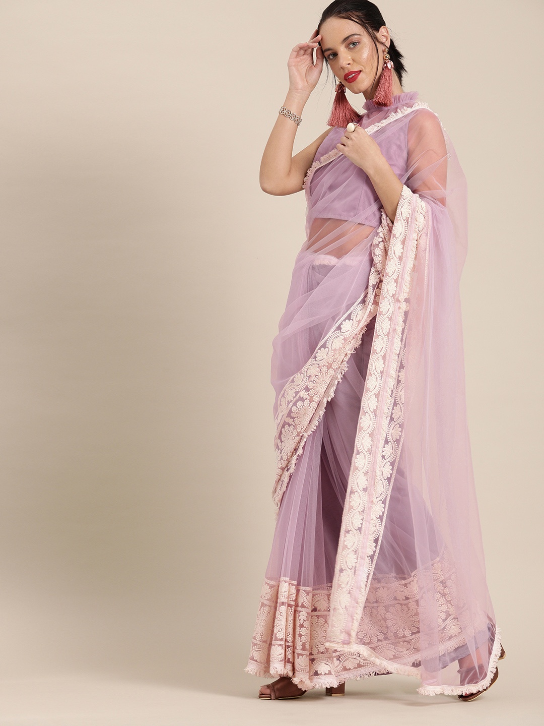 

Inddus Lavender Solid Net Saree With Embroidery